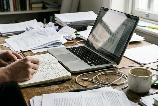 Editorial desk with notes and drafts concerning Bitcoin self-custody and intermediary control points